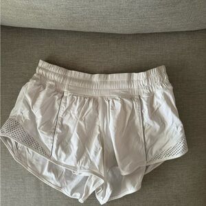 Lulemon white shorts- not sure of the style but hard to find. Metallic siding.